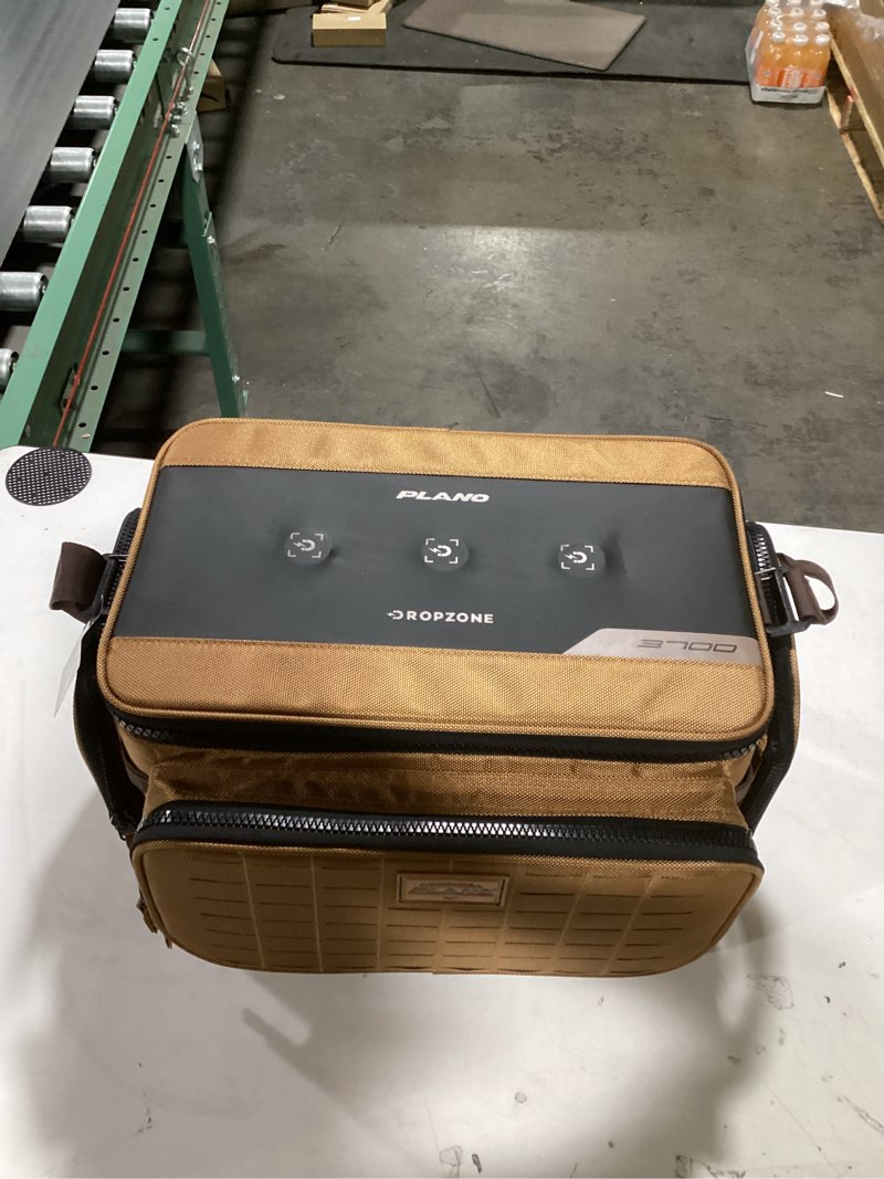 Condition photo showing As Is for Plano Guide Series Tackle Bag | Premium Tackle Storage with No Slip Base and Included stows, Khaki with Brown and Black Trim