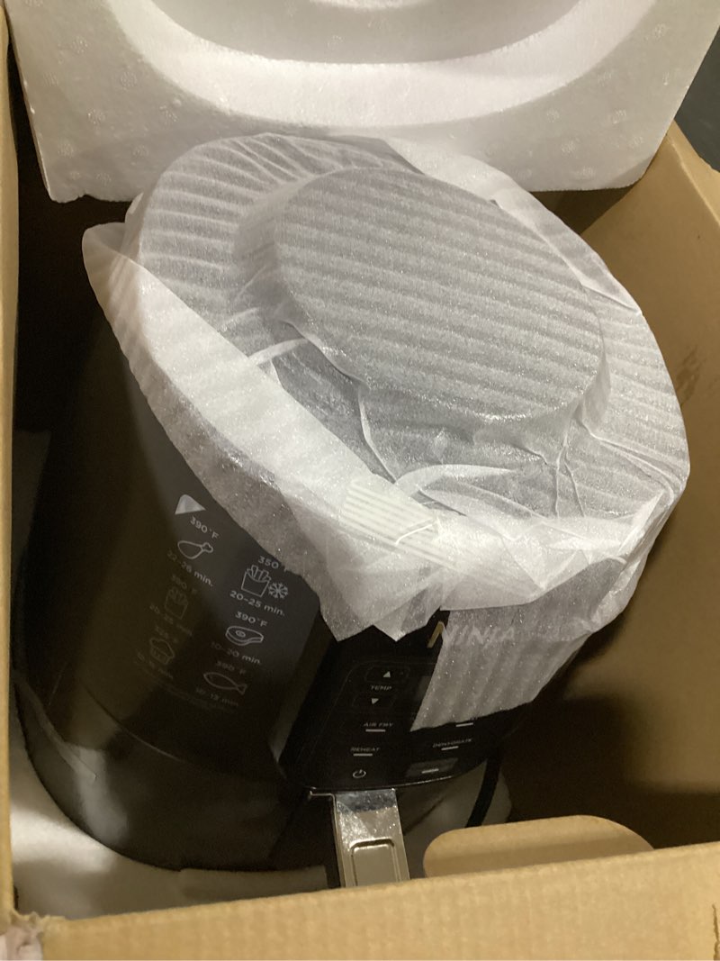 Condition photo showing As Is for ninja air fryer | 4 qt capacity | 4-in-1 roast, crisp, roast, reheats, & dehydrates | dishwasher safe parts | 105°f-400°f | includes 20 easy & healthy recipes | 1550 watt | grey | af101