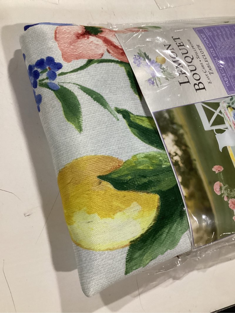 Condition photo showing Good Condition for benson mills spillproof spring/summer durable heavyweight fabric indoor outdoor tablecloth, outdoor washable table cloth for round tables, picnic/patio table covers (70" round, lemon bouquet) 70" (round) lemon bouquet
