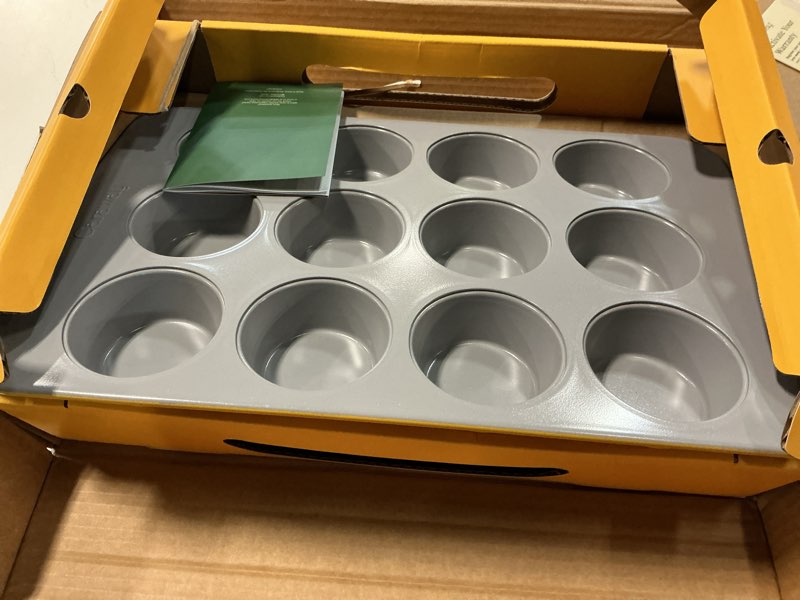 Condition photo showing Good Condition for caraway non-stick ceramic-coated 12-cup muffin pan | naturally slick ceramic coating, non-toxic, ptfe and pfoa free, perfect for cupcakes, muffins, and more, marigold marigold muffin pan (12 cup)