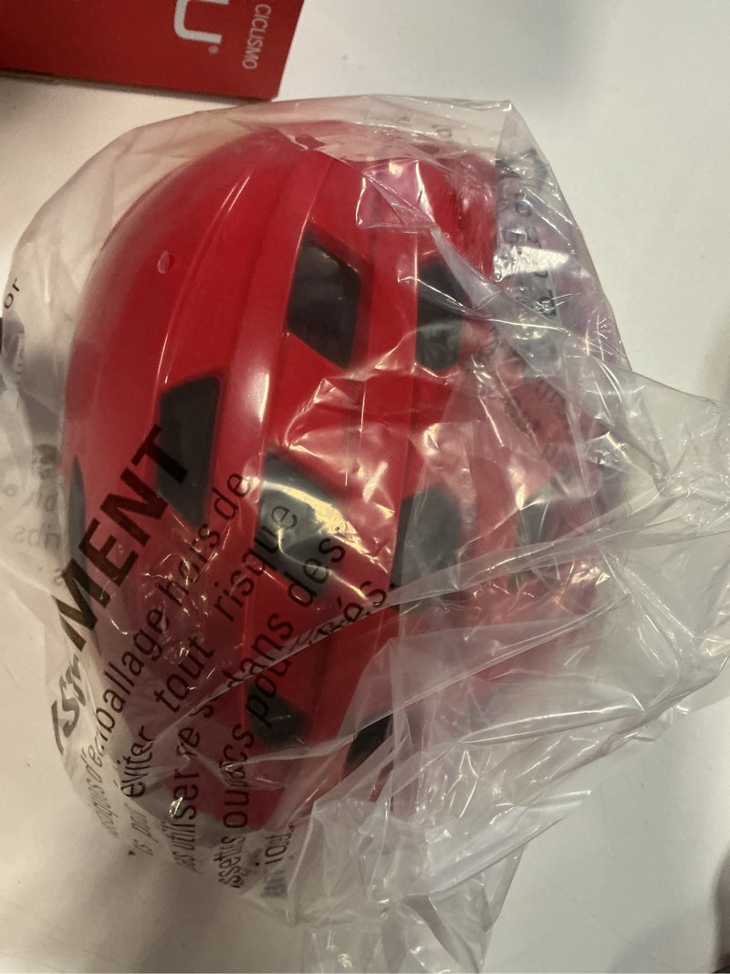 Condition photo showing New/Like New for garneau piccolo helmet 20.5-21.75”