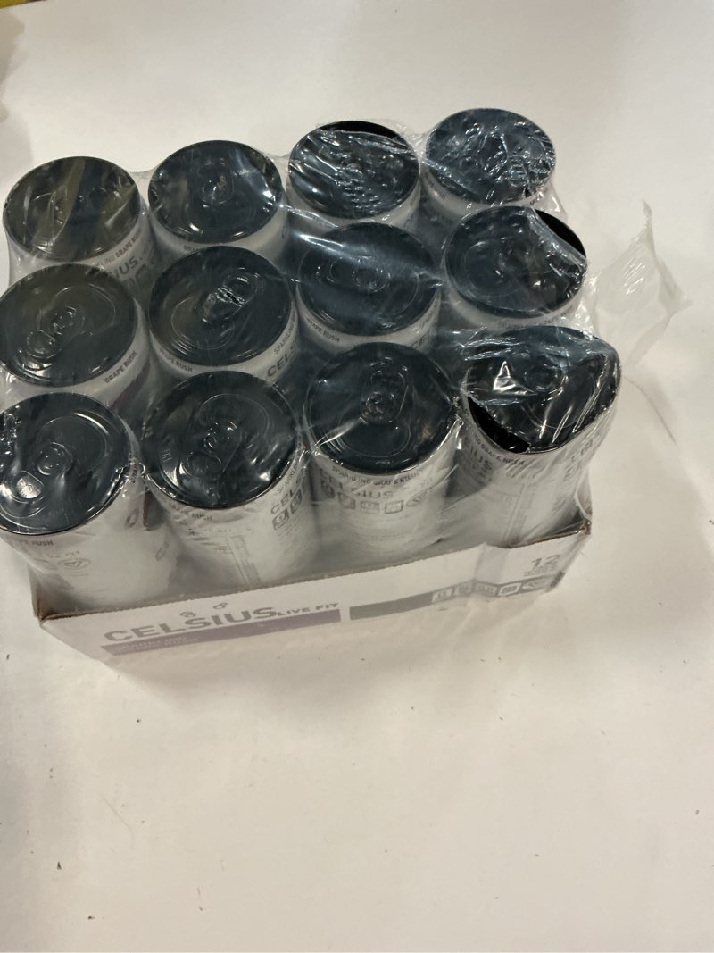 Condition photo showing New/Like New for Expires 06/26 CELSIUS Sparkling Grape Rush, Functional Essential Energy Drink 12 Fl Oz (Pack of 12)