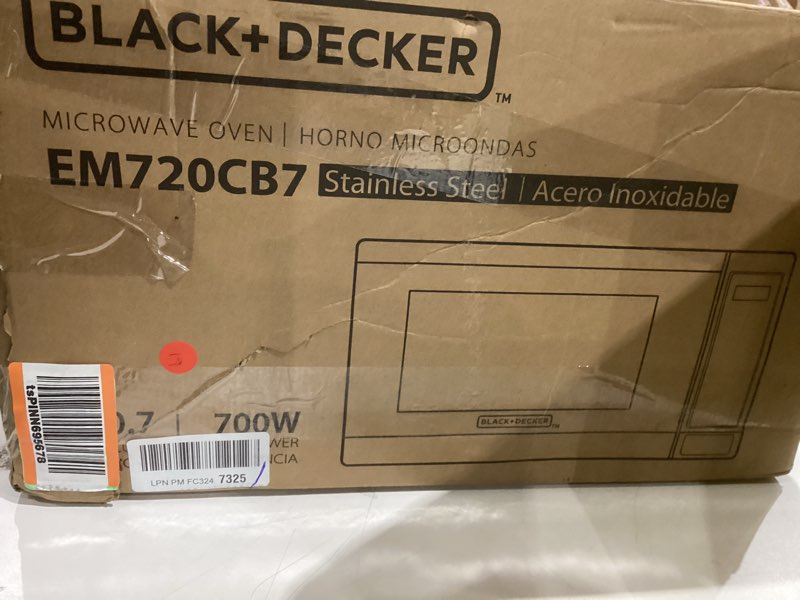 Condition photo showing Good Condition for BLACK+DECKER EM720CB7 Digital Microwave Oven with Turntable Push-Button Door, Child Safety Lock, 700W, Stainless Steel, 0.7 Cu.ft 0.7 cu. ft.