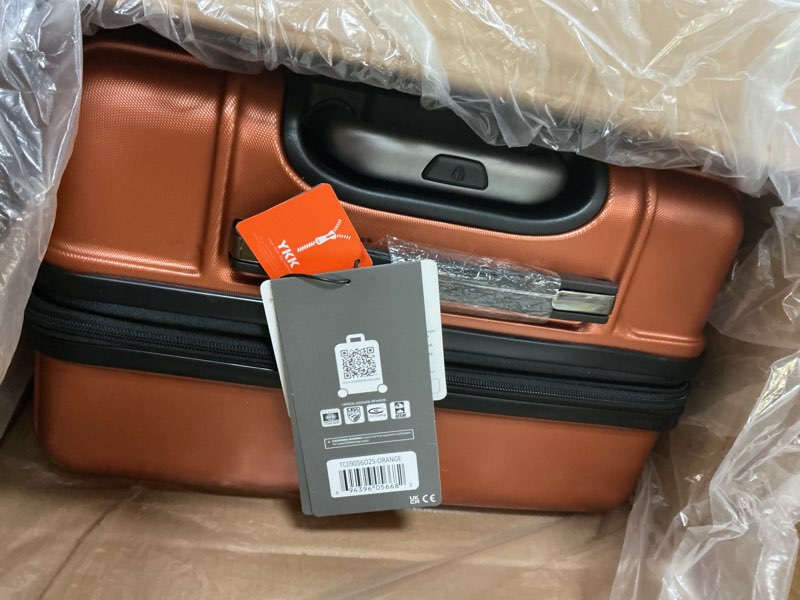 Condition photo showing Good Condition for Traveler's Choice Archer Polycarbonate Hardside Spinner Luggage Set, Orange, Checked 25-Inch