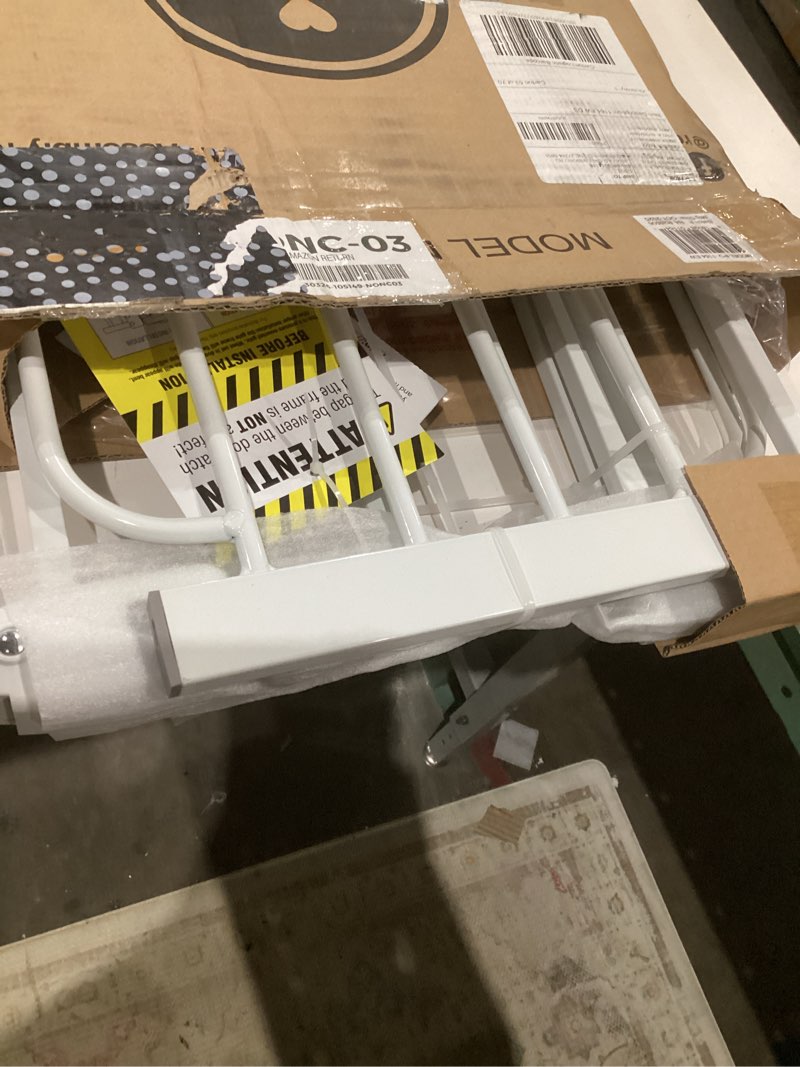 Condition photo showing As Is for regalo easy step 49-inch extra wide baby gate, includes 4-inch and 12-inch extension kit, 4 pack of pressure mount kit and 4 pack of wall mount kit white 29-49"w x 30"h