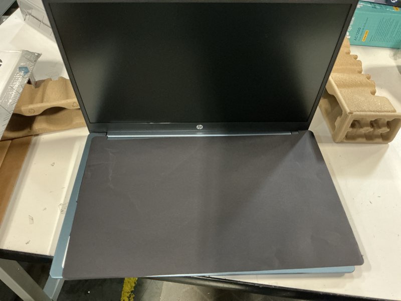 Condition photo showing As Is for (password-protected)hp 15.6 inch hd windows laptop intel processor n200 4gb ram 128gb ufs moonlight blue