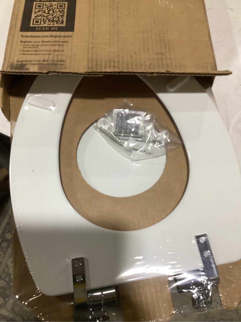 Condition photo showing Good Condition for mayfair benton? elongated enameled wood toilet seat in white with sta-tite? seat fastening system? and whisper•close? chrome hinge