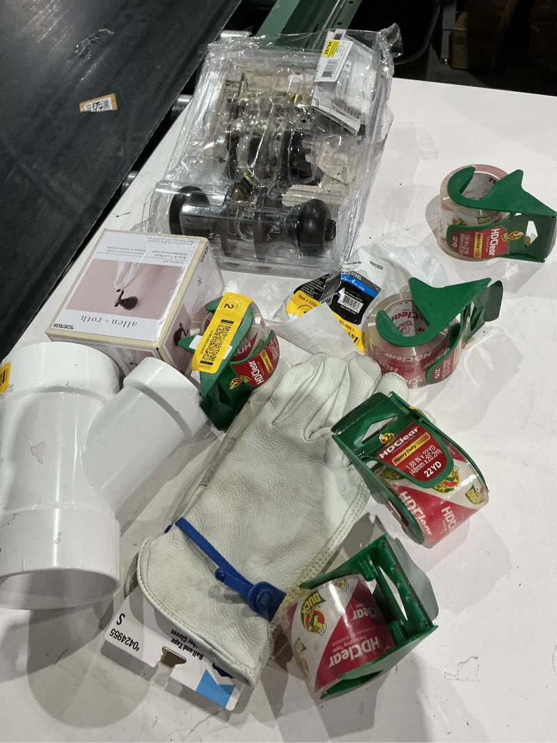 Condition photo showing As Is for assorted home improvement lot (small tools, screw, home accessories, etc.)