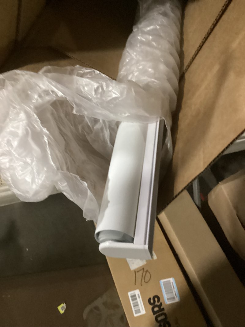 Condition photo showing Good Condition for ChrisDowa Cordless Blackout Roller Shades for Windows, Thermal Insulated UV Protection Pull Down Shades, Total Blackout Window Blinds for Home, Office, Bedroom, Door (36" W x 72" H, White) 36"W x 72"H White