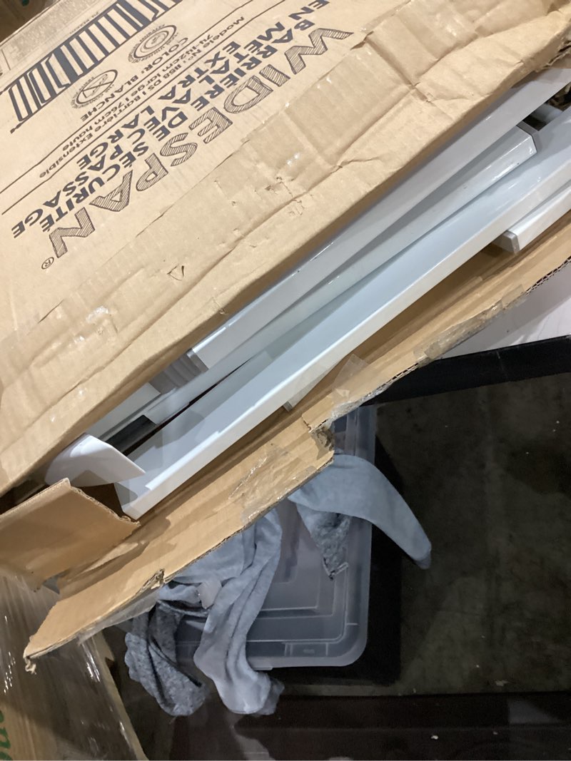 Condition photo showing As Is for regalo safety baby gate 56 inch extra wide for doorways & bottom of stairs, pressure mount design for babies, toddlers & pets, tested & safe for 30 years, american designed, american owned, white white 29-56"w x 30"h