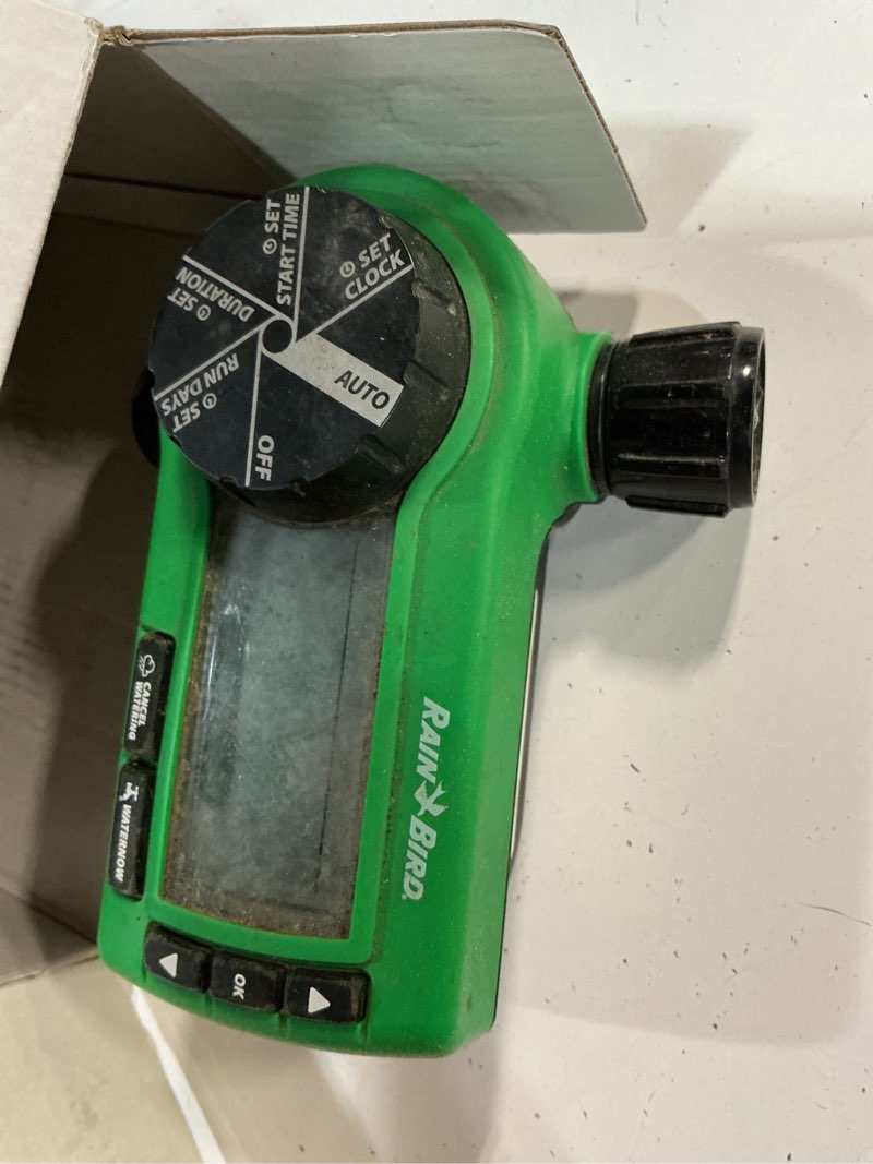 Condition photo showing As Is for rain bird 1zehtmr professional grade electronic digital hose end timer/controller, one zone/station, battery operated, digital with plastic inlet/outlet digital w/ plastic inlet/outlet