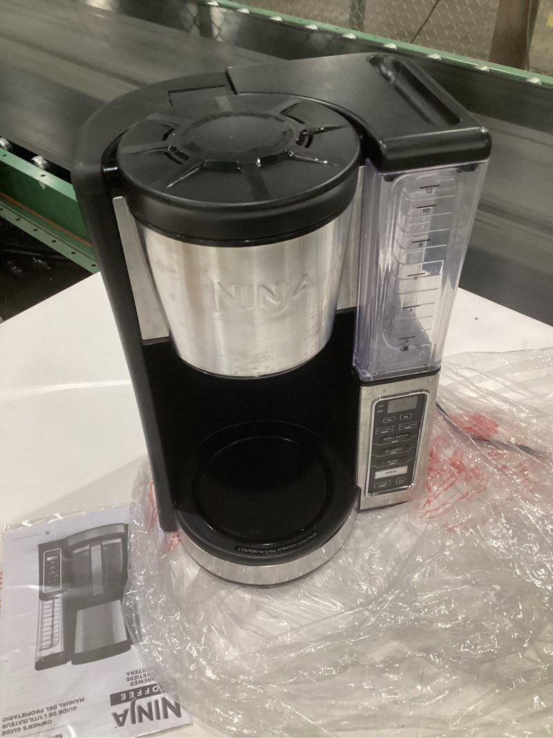 Condition photo showing As Is for (incomplete parts, not tested, used)ninja 12-cup programmable coffee brewer, 2 brew styles, adjustable warm plate, 60oz water reservoir, delay brew - black/stainless steel
