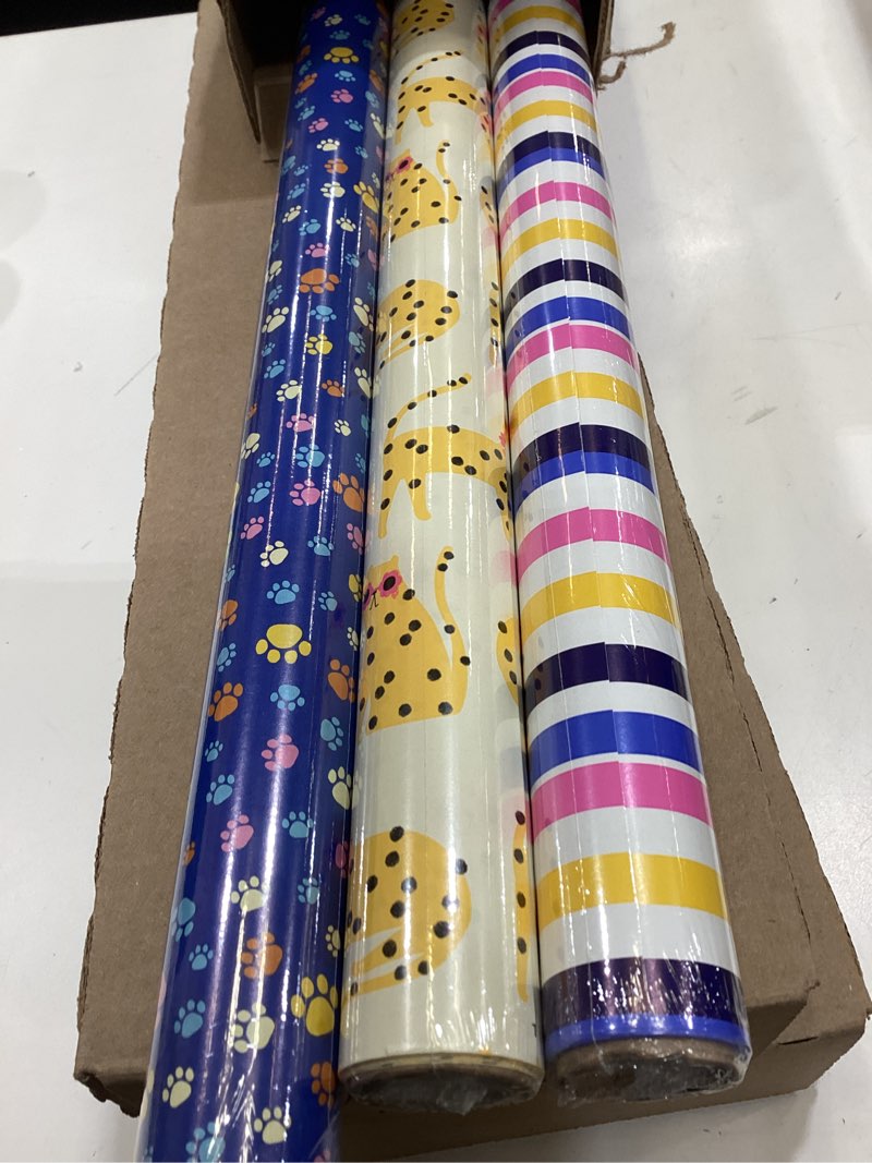 Condition photo showing Good Condition for hallmark cat wrapping paper rolls with cutlines on reverse (3 rolls: 75 sq. ft. total) cheetahs in s