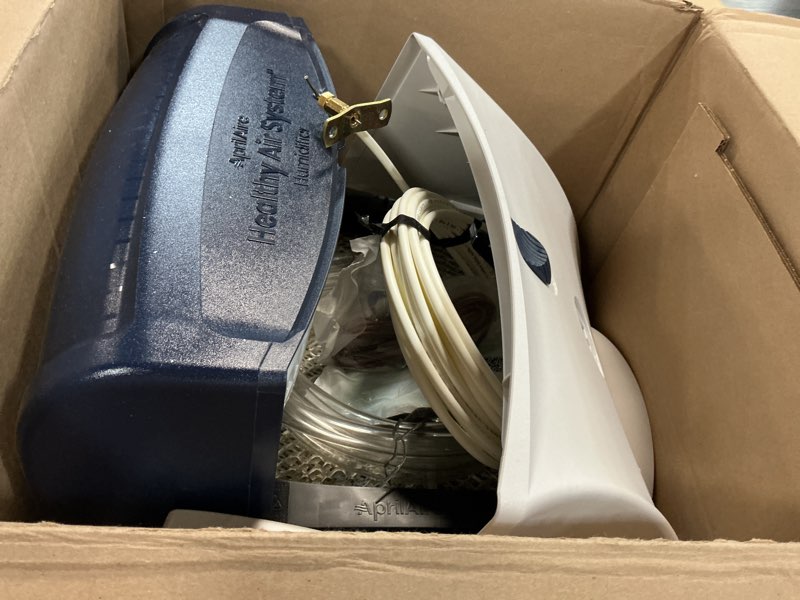 Condition photo showing As Is for aprilaire 720mkz whole-house fan-powered evaporative humidifier – 21 gpd, water saving, manual control, installation kit, for up to 6,250 sq. ft., part of the aprilaire healthy air system humidifier + install kit w/ hydrocore