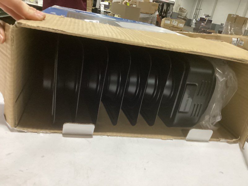 Condition photo showing As Is for  Utilitech 1500 -Watt Oil-filled radiant Utility Indoor Electric Space Heater with Thermostat