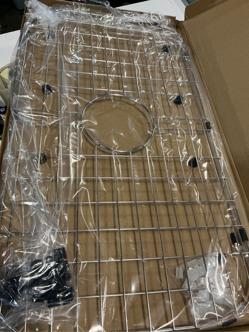 Condition photo showing New/Like New for Serene Valley Sink Protector Grid 26-1/16" x 14-1/16", Centered Drain with Corner Radius 3-1/2", 304 Stainless Steel Material NLW2614C