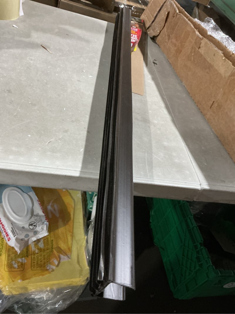 Condition photo showing Good Condition for m-d building products vinyl cinch u-shape door bottom seal, slide-on weatherstripping draft stopper, easy to install, fits 36” x 1-3/4” doors, fills 3/8”- 3/4” gaps, 43337, brown