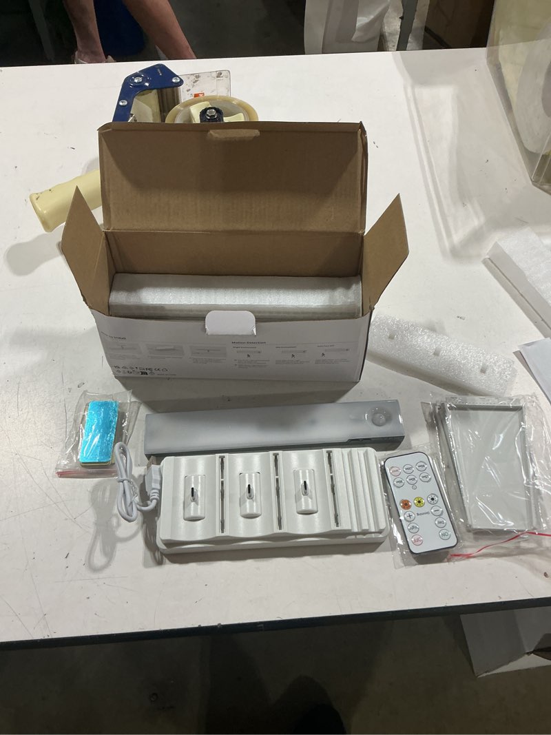 Condition photo showing Good Condition for ezvalo 6-pack under cabinet lighting with charging station, 2000mah rechargeable wireless motion sensor lights, 3 color temps, dimmable, timer, magnetic, with remote control for kitchen, closet, stair 6pack with station
