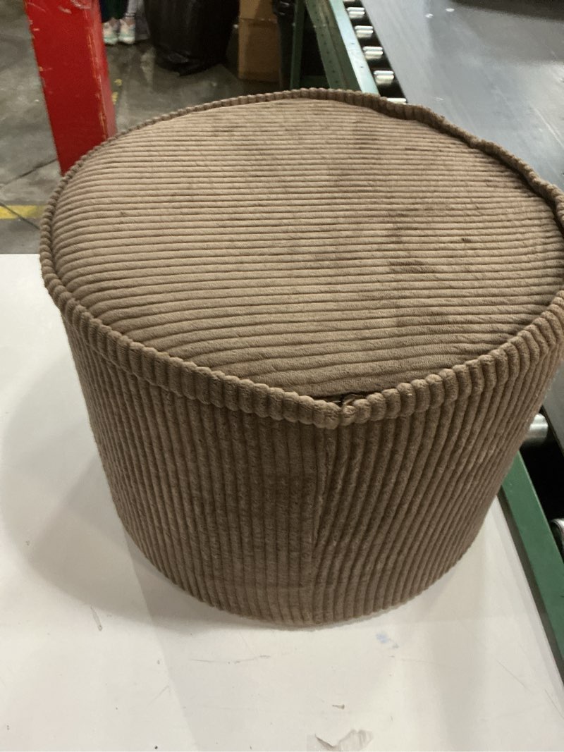 Condition photo showing As Is for toffee pouffe