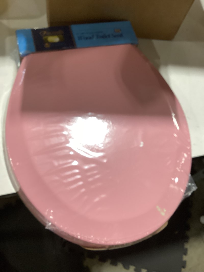 Condition photo showing Good Condition for toilet seat, slow close, soft touch, ultra-smooth matte finish (no orange-peel texture), premium moulded wood, quick release, piklids (pink, round) pink round