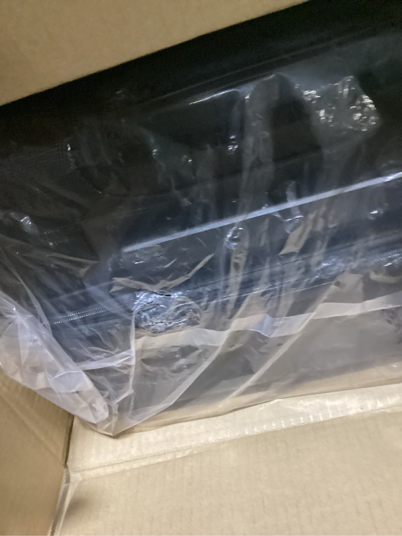 Condition photo showing As Is for Amazon Basics 26" Hardside Medium Checked Luggage, Hardshell Suitcase With Wheels, Expandable For Up to 15% More Space, With Scratch-Resistant Surface, Four Multi-directional Wheels, Black Black Medium Checked