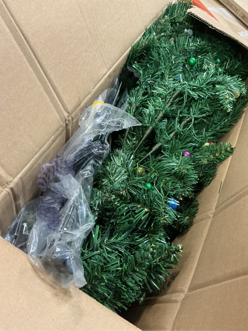 Condition photo showing Good Condition for 4FT Prelit Christmas Tree, Artificial PVC Christmas Tree with 100 Colorful Globe String Lights, Sturdy Iron Stand, Easy Set-up, New PVC Green Xmas Tree for Holiday Décor