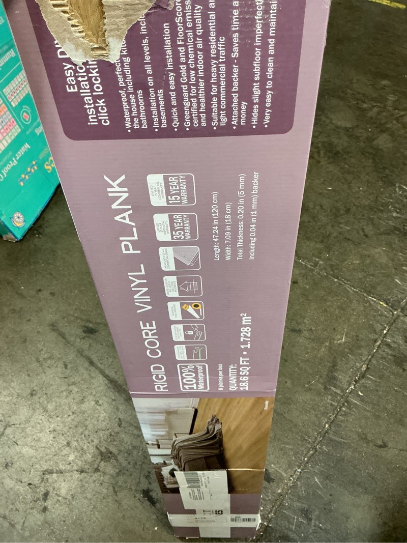 Condition photo showing Good Condition for select surfaces riverside vinyl plank flooring 18.6 sq ft 8 planks per box 