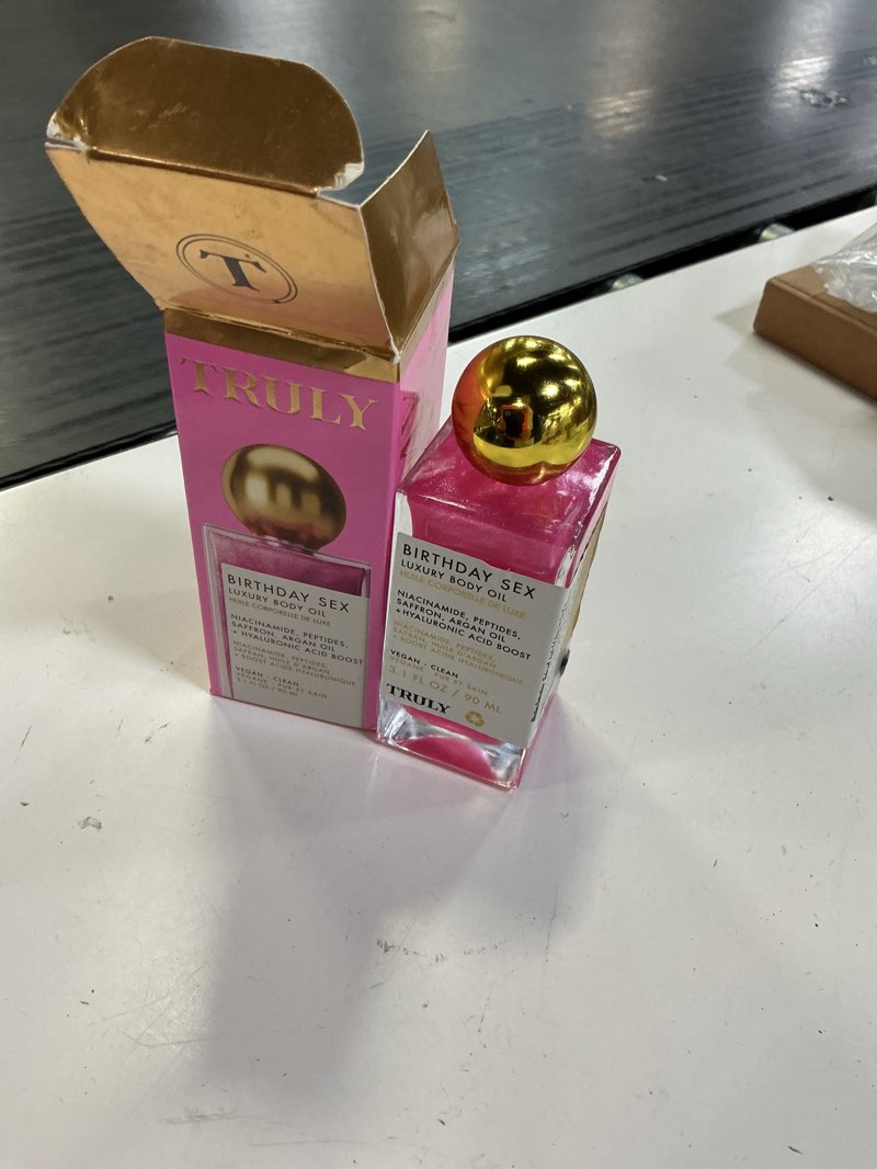 Condition photo showing Good Condition for truly luxury body oil | hydrating & illuminating with natural shimmer | for smooth, glowing skin and long-lasting fragrance birthday sex
