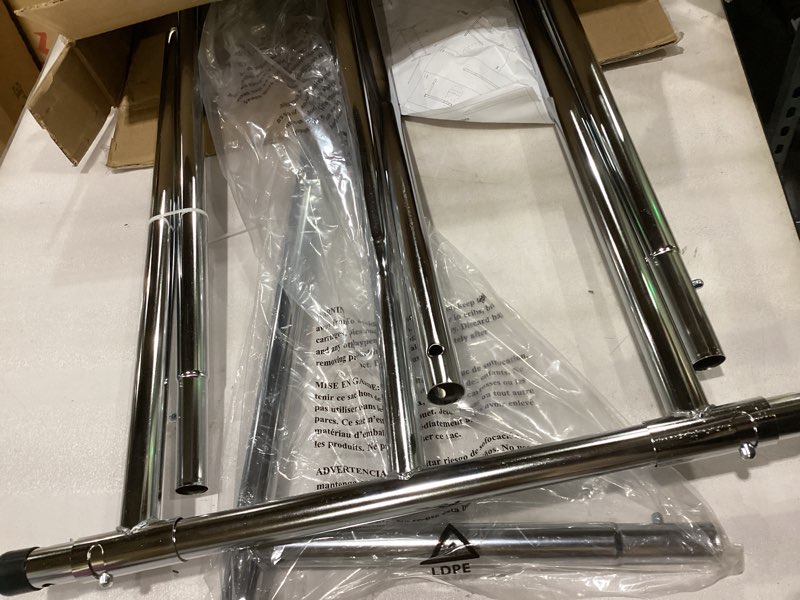 Condition photo showing New/Like New for Simple Houseware Supreme Commercial Grade Clothing Garment Rack, Holds Up to 250 lbs, 50 to 75 Inches Extendable Rod, Chrome Commercial Grade Chrome