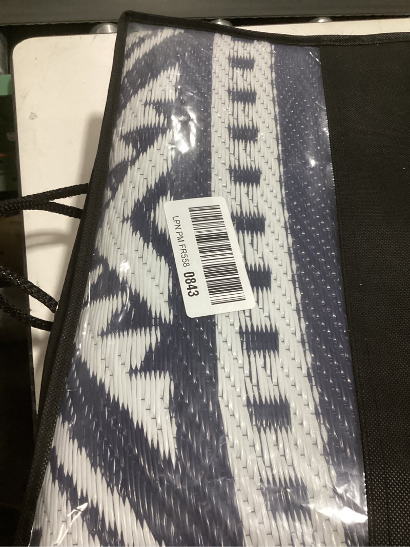 Condition photo showing Good Condition for olanly outdoor rug waterproof 5x8 ft, reversible outdoor plastic straw rug, boho patio rug, indoor outdoor carpet, rv mat outside for patio, camp, picnic, balcony, deck, backyard, navy & white navy blue & white 5' x 8' (rectangular)