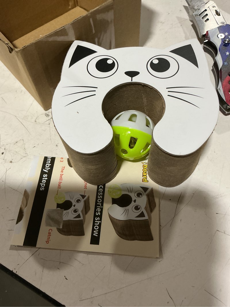 Condition photo showing New/Like New for kitty curls cat toy (large) twisty paws kurlz | magnetic magic organ cat scratcher | interactive cardboard with bell ball & hanging teaser | honeycomb design | 1 pcs teaser 1 pcs scratcher brown and white