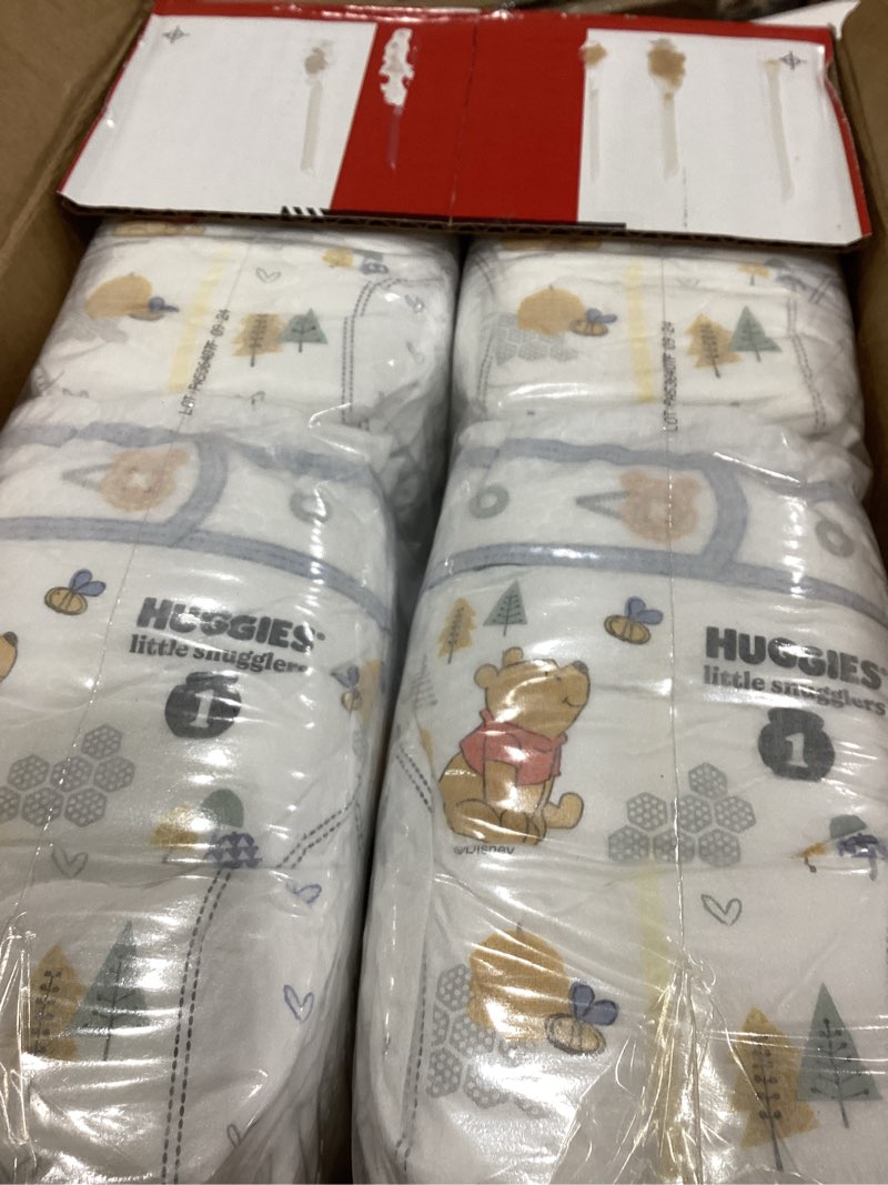 Condition photo showing New/Like New for Huggies Size 1 Diapers, Little Snugglers Baby Diapers, Size 1 (8-14 lbs), 96 Count, Packaging May Vary Size 1 96