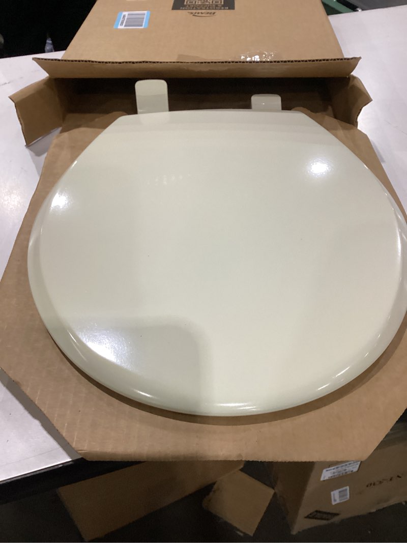 Condition photo showing As Is for mayfair cassel slow close toilet seat, easy clean, non slip premium wood seat, easy install, made in usa, round, bone seat round