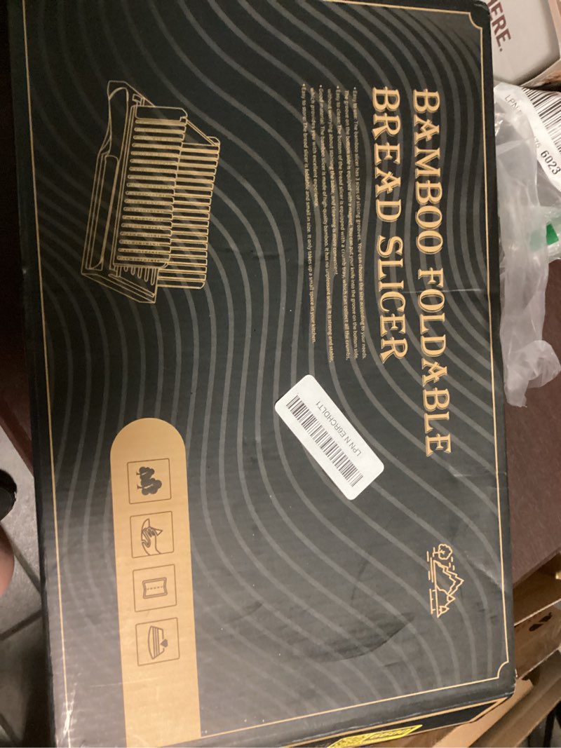 Condition photo showing New/Like New for bamboo bread slicer with serrated knife, adjustable guide for 3 thickness sizes, foldable chopping board with crumb tray, great for homemade bread, cakes, bagels a - with knife