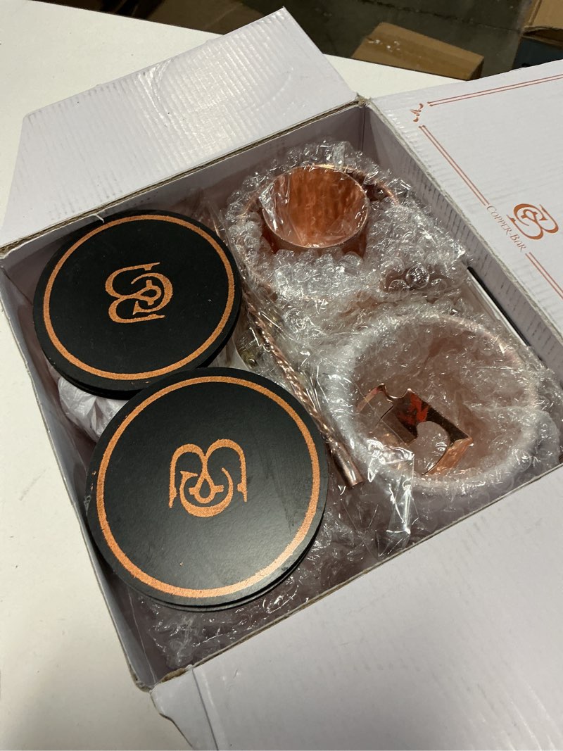 Condition photo showing New/Like New for copper-bar moscow mule copper mugs - unique handcrafted gift set of 4, hammered by artisan, 100% pure solid copper cups 16oz for drinking water & cocktails, include 19 pcs accessories & special opener set of 4 (black) 100% pure copper