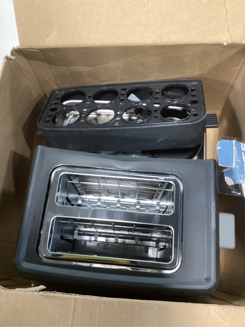 Condition photo showing As Is for West Bend Breakfast Station 2-Slice Toaster and Egg Cooker/Poacher with Removable Pre-Cooked Meat and Vegetable Warming Tray for Perfect Breakfast Sandwiches, 1200-Watts, Black