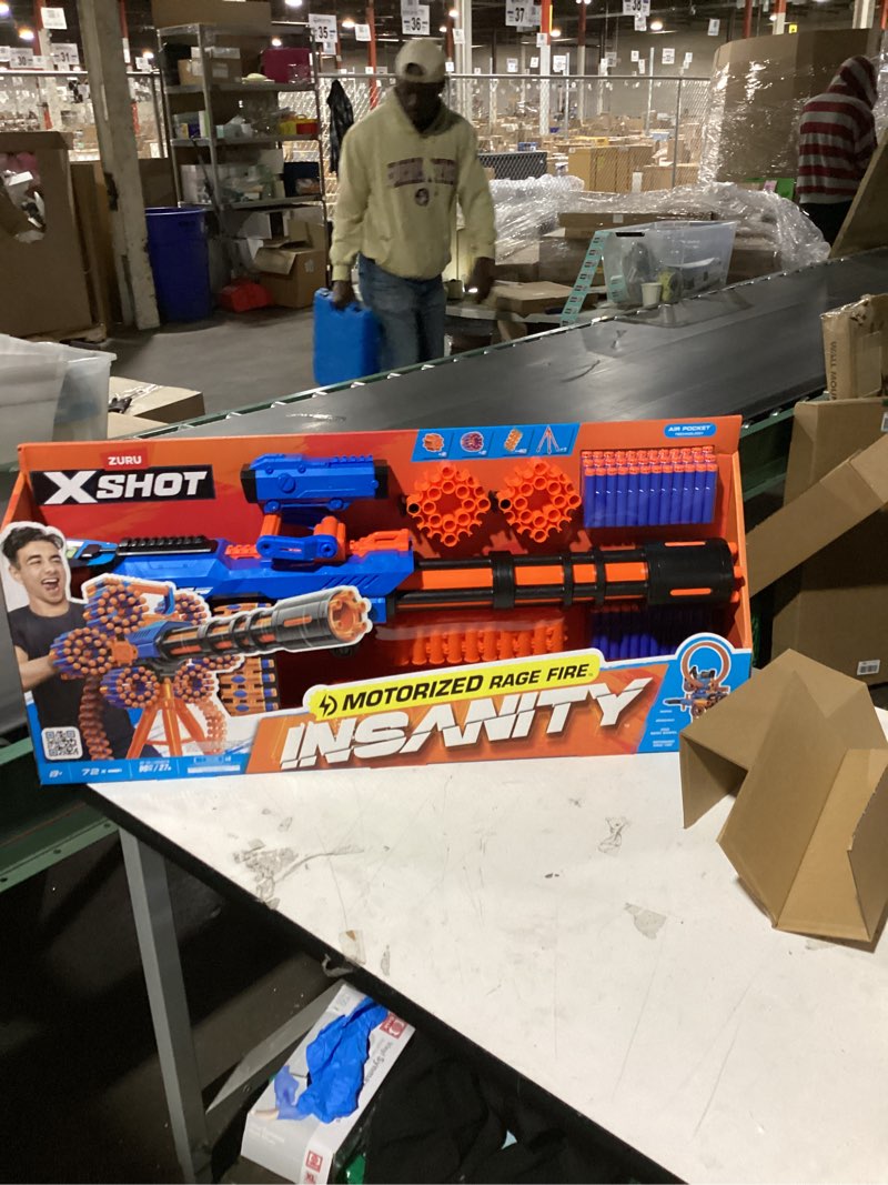 Condition photo showing New/Like New for x-shot insanity motorized rage fire by zuru 72 darts, air pocket technology darts, dart storage, blasting power, auto feeding belt, tripod & scope, outdoor toy for boys, girls, teens, adults