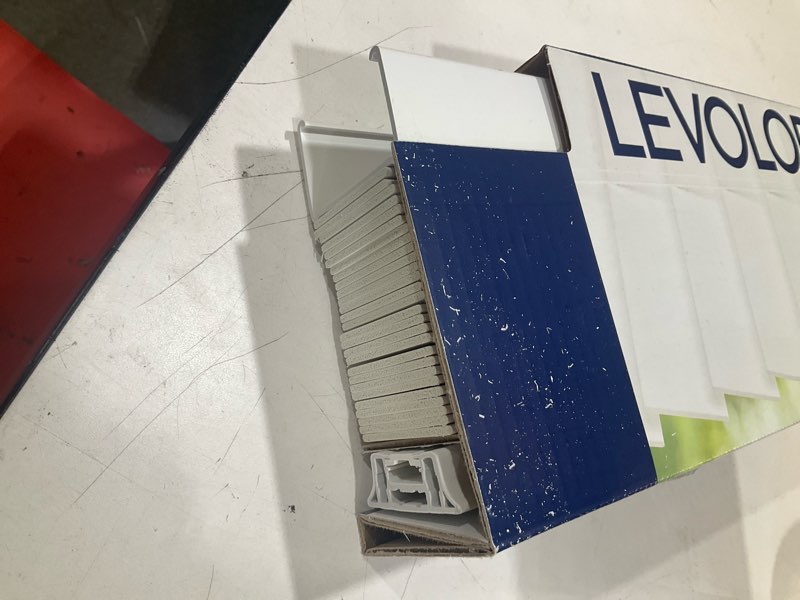 Condition photo showing As Is for levolor trim+go 2-in slat width 23-in x 48-in cordless white faux wood room darkening horizontal blinds