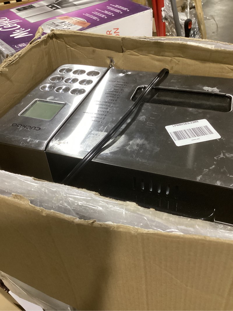 Condition photo showing As Is for CUCKOO Bread Maker Machine with 15 Menu Options + 3 Crust Colors, 2 lbs Bread Machine with Automatic Fruit & Nut Dispenser, Includes 6 Accessories, Ideal Breadmaker for Sourdough (CBM-AAB101S)