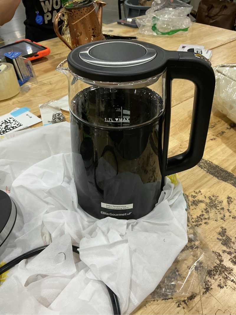 Condition photo showing As Is for elite gourmet 1.7l dual-wall cool-touch tea kettle, touchscreen, black | borosilicate glass, 304 stainless steel interior, programmed digital keep warm, auto off & audible indicator