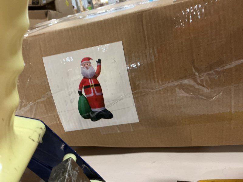 Condition photo showing As Is for 16 Ft by 9.4 Ft Giant Christmas Inflatable Santa Claus Holding Gift Bag, Lighted Blow Up Christmas Decoration Outdoor with 7 LED Lights Santa Inflatables for Lawn Yard Holiday Party Decor