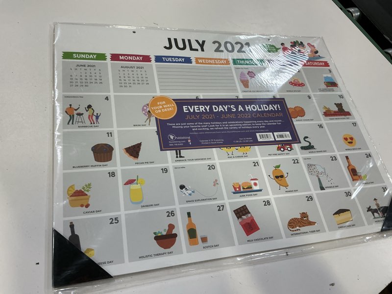 Condition photo showing New/Like New for tf publishing - july 2021 - june 2022 every day's a holiday large desk pad monthly blotter calendar - 12 month academic year wall calendar - tear-off pages - landscape-oriented - 22” x 17”