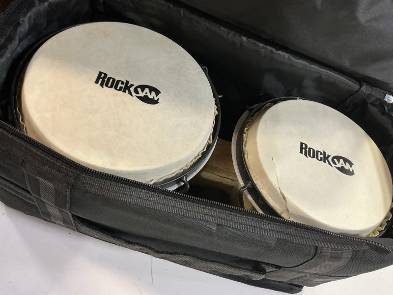 Condition photo showing As Is for rockjam 7" and 8" bongo drum set with padded bag and tuning key natural