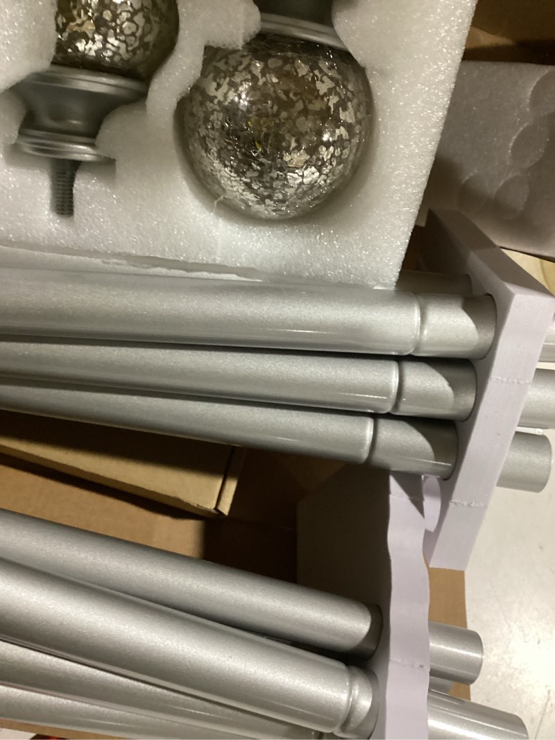 Condition photo showing New/Like New for KAMANINA 2 Pack Curtain Rods for Windows 48 to 84 Inches, Silver Decorative Curtain Rod 32 to 86 inch(2.6-7.1ft), 7/8 inch Single Drapery Rods with Crackle Glass Finials Silver 48-84" (2Pack)