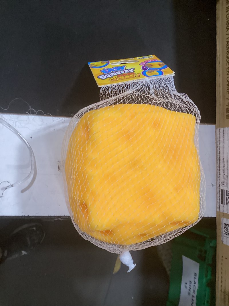 Condition photo showing New/Like New for orb easy sqweezy super cheesy - squeeze this big, fun, squishy, slow rising, extra soft giant block of cheese for stress relief - original sensory / fidget novelty toy and gift for kids and adults