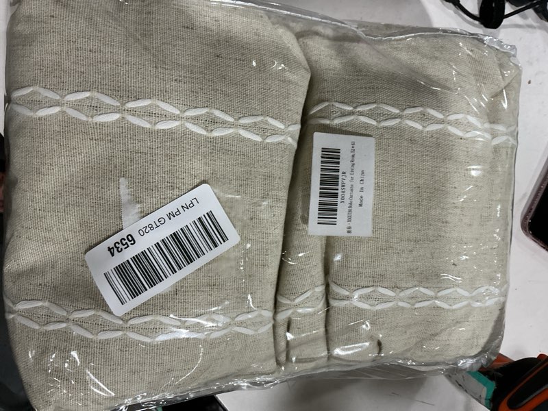 Condition photo showing Good Condition for boho blackout curtains 63 inches long beige linen blend 2 panels with tassels and cotton embroidery, farmhouse vintage rustic rod pocket drapes for living room or bedroom beige 52"w x 63"l (pack of 2)