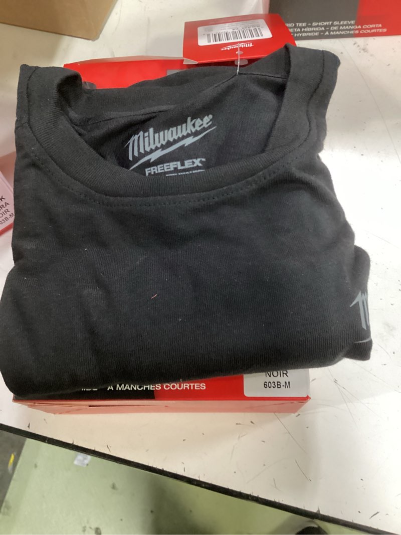 Condition photo showing New/Like New for men's medium black cotton/polyester short-sleeve hybrid work t-shirt