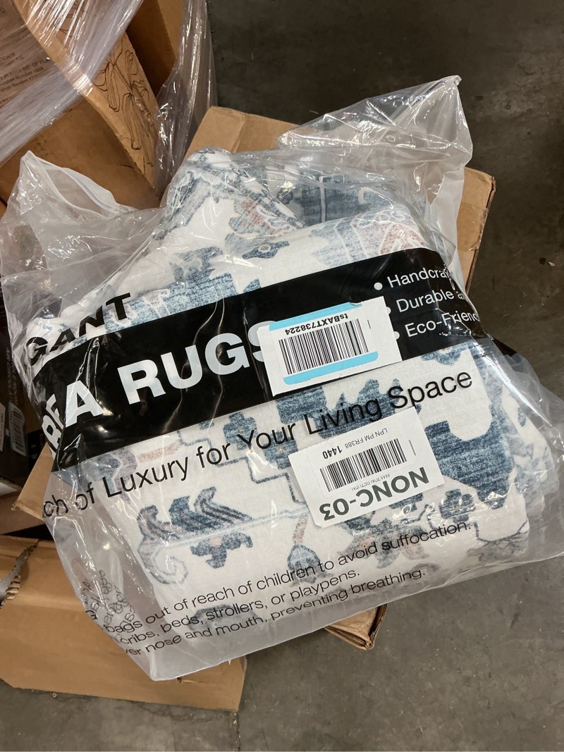 Condition photo showing As Is for blue deisgn machine washable area rug