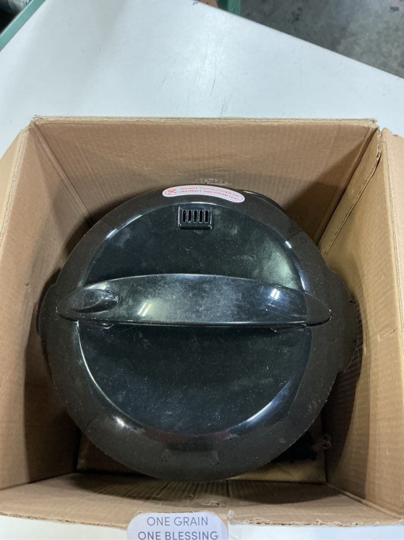 Condition photo showing As Is for aroma digital rice cooker, 4-cup (uncooked) / 8-cup (cooked), steamer, grain cooker, multicooker, 2 qt, stainless steel exterior, arc-914sbd 4 cup uncooked / 8 cup cooked