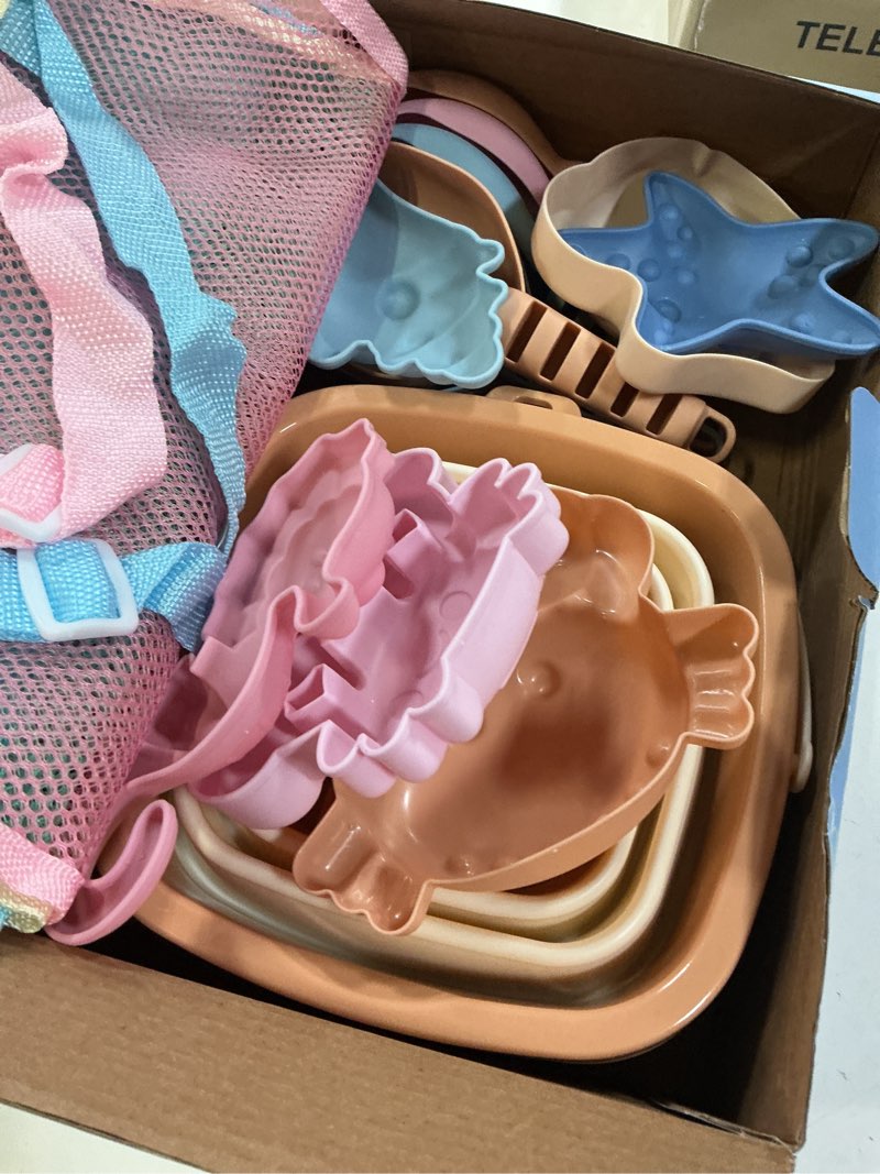 Condition photo showing New/Like New for dreamon beach toys set for kids 3-10, collapsible sand buckets with beach molds and mesh bag, 3 pack shovels set sand toys for beach, sandbox travel toys for toddlers kids pink/orange/blue